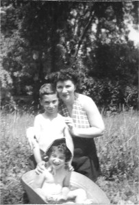 Mom, brother, and the little nightmare - summer of '47 in Val Morin. Look, he's daring to touch 'it'! :-D