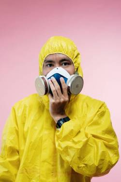 person in yellow coveralls